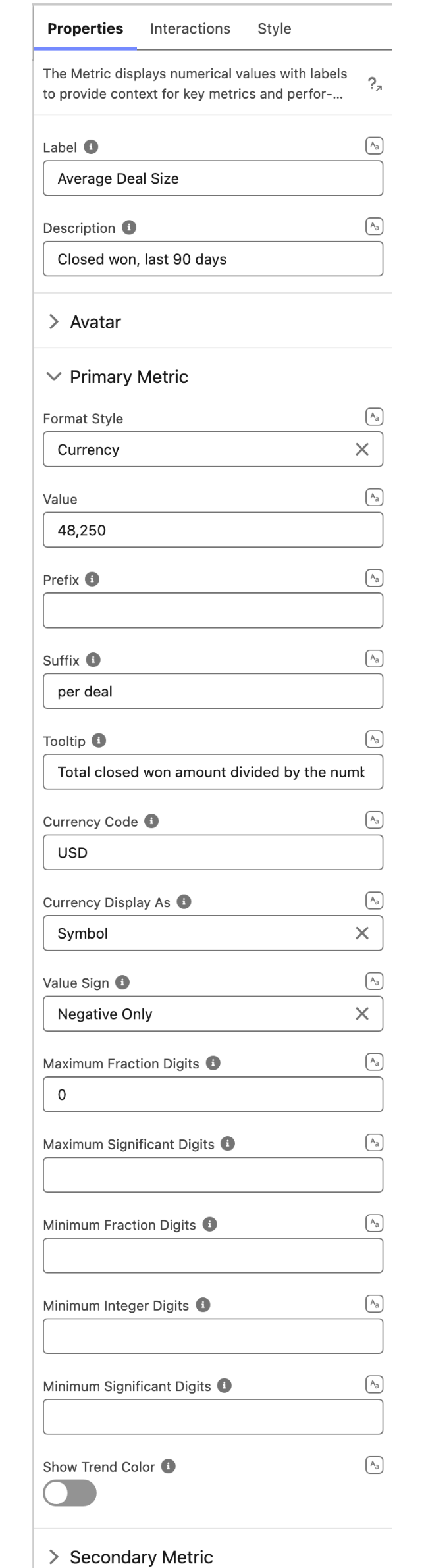The Properties tab of the Metric property editor, showing the Primary Metric group with Format Style set to Currency